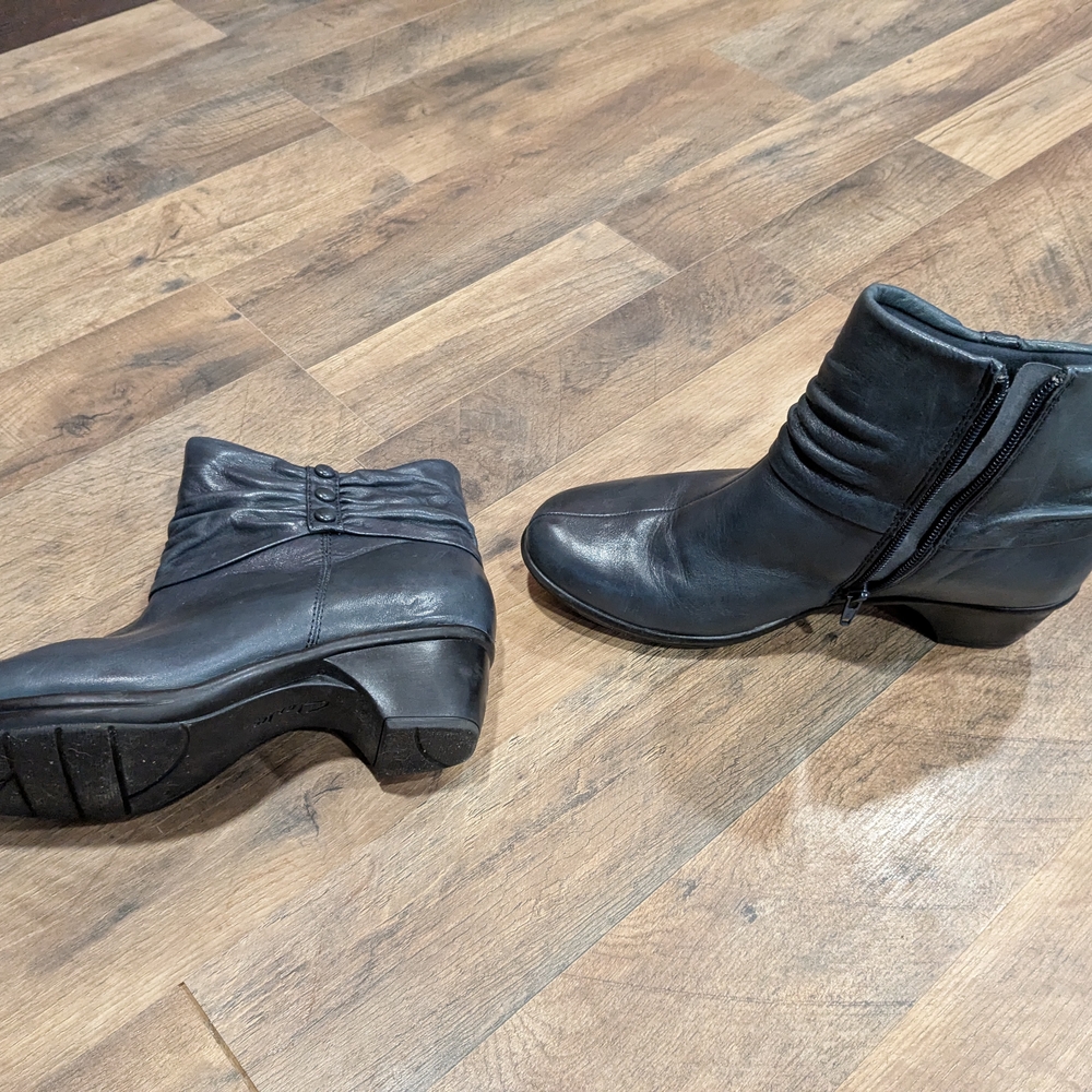 Clarks Navy Ankle Booties with Sleek Design